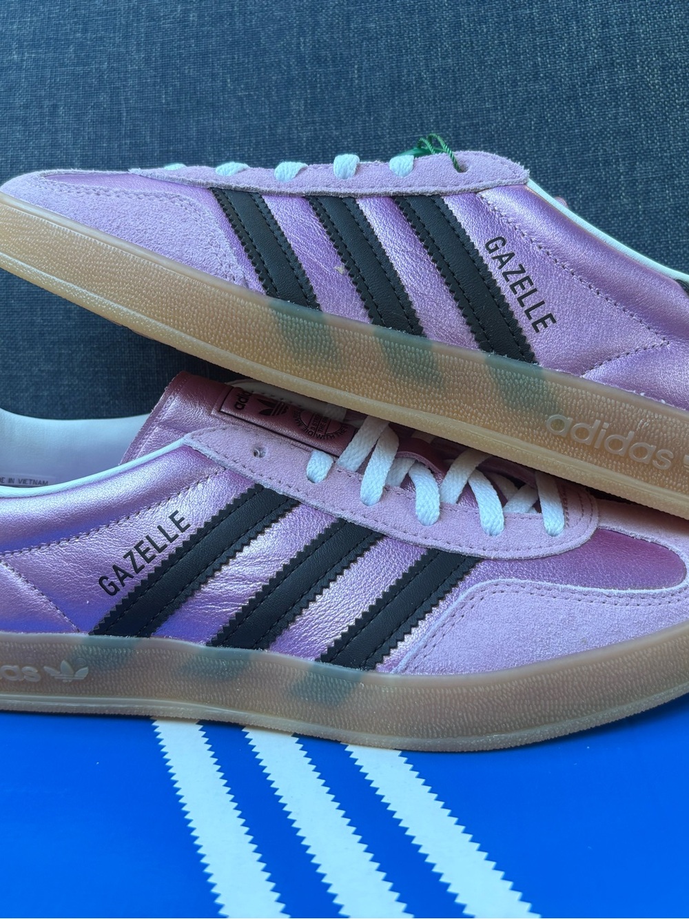 Adidas Gazelle Sneakers in Metallic pink with Black Stripes and a gum bottom